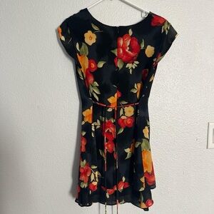 Vintage 90s scoop neck mini dress 
Caren Desiree